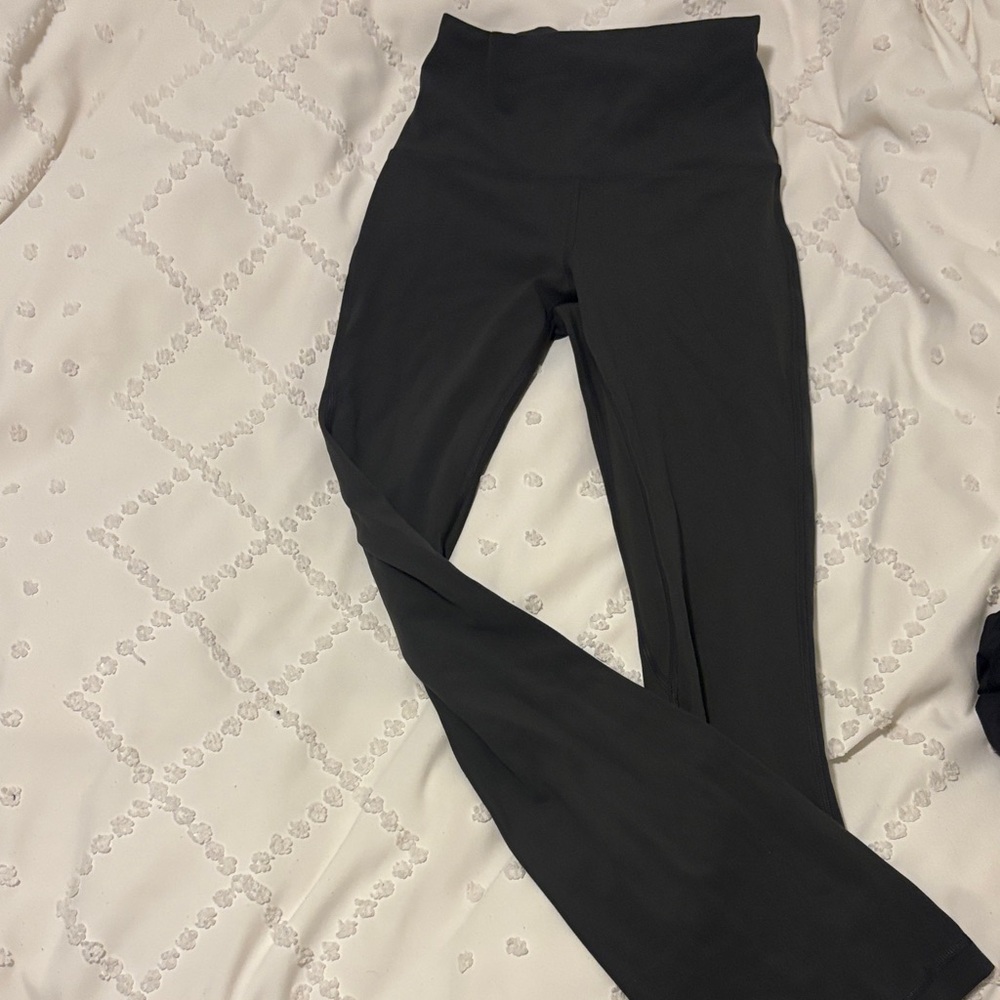 Lululemon mini-flared leggings. (Dark Grey)